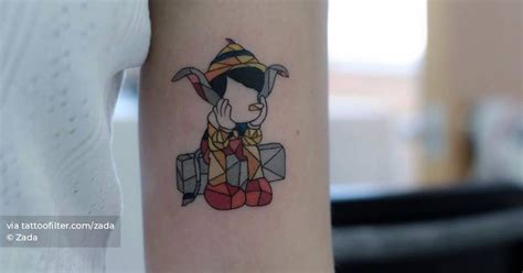 Pinocchio Tattoo On The Bicep