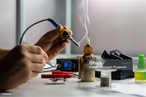 Soldering Iron With Smoke From Boiling Rosin Or Colophony B Stock Photo ...