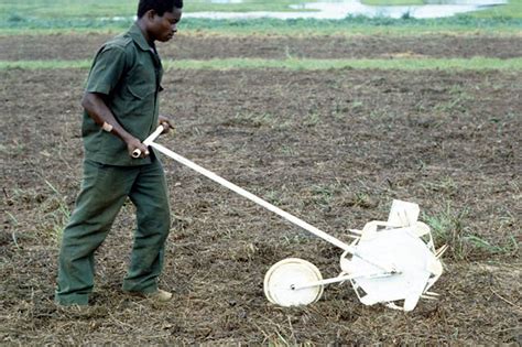 Manual Maize Planter Man Operating Manual Maize Planter In Flickr