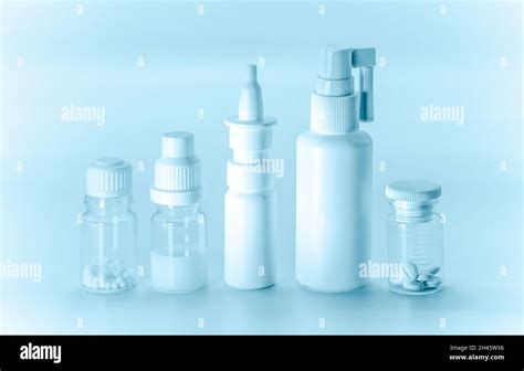 Vials Of Medicines White In Blue Tinted Stock Photo Alamy