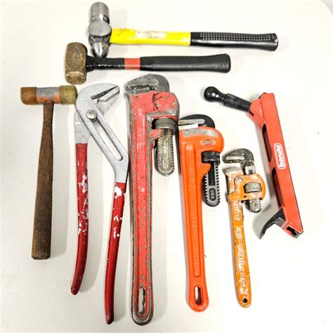 Lot #G 255 - Assorted Tools, Plumbing Wrenches and Hammers - Legacies ...