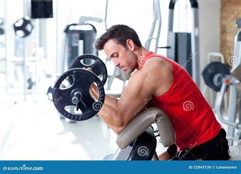 Man With Weight Training Equipment On Sport Gym Stock Image Image Of