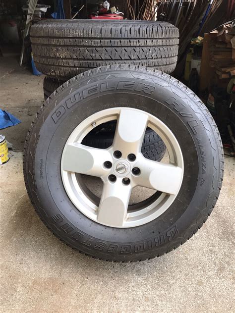 bridgestone p   mounted  nissan factory alloy wheels ebay