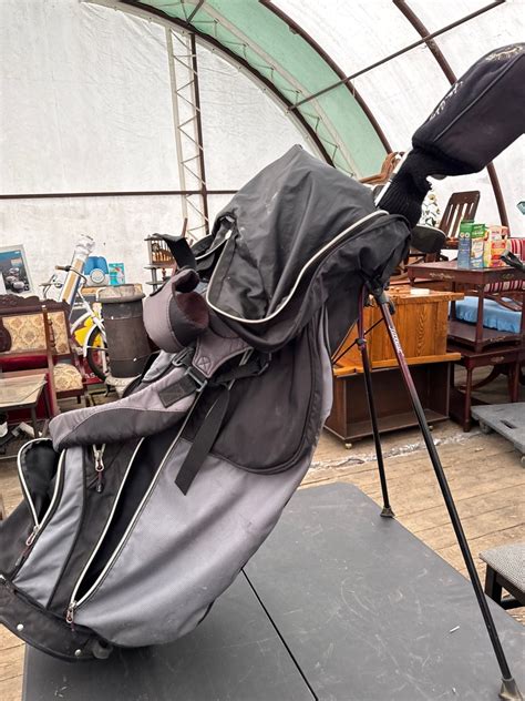 TITLIST GOLF BAG FULL OF CLUBS AND DRIVERS AND ACCESSORIES