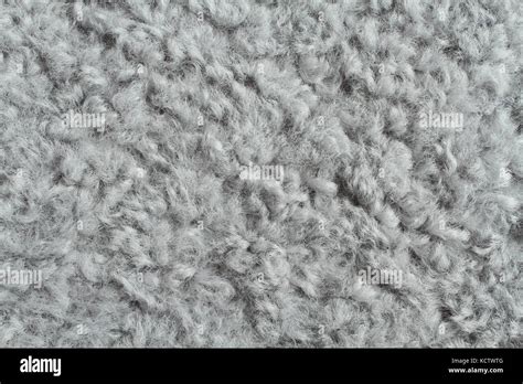 Light gray artificial curly fur texture Stock Photo - Alamy