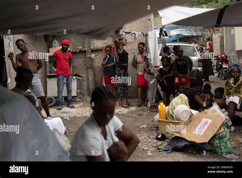 People Displaced By Gang Violence Gather In The Front Yard Of Jean Kere Almicars Front Yard