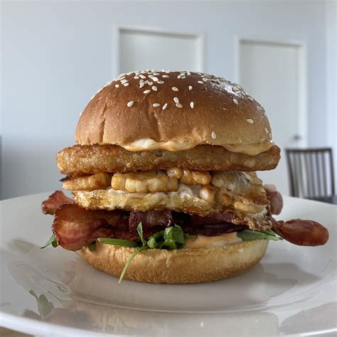 Brekkie burger with the works - brioche bun, sriracha mayo, hash brown