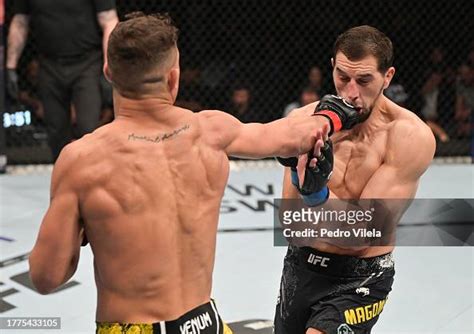 Caio Borralho of Brazil punches Abus Magomedov of Russia in a... News ...