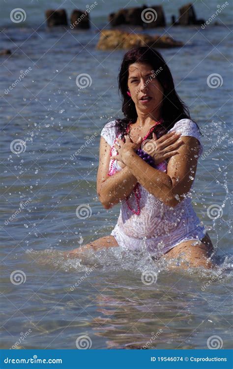 Beautiful Woman Splashing In The Ocean 1 Stock Photo Image Of