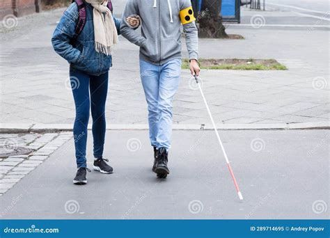 Woman Helping Blind Man While Crossing Road Stock Image Image Of