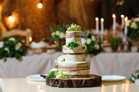 Premium Photo Naked Wedding Cake Decorated With Fresh Flowers Greenery Delicious Dessert At