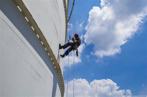 Premium Photo Male Worker Rope Access Height Safety Inspection Of