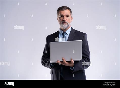 Always Ready To Help You Confident Mature Man In Formalwear Holding