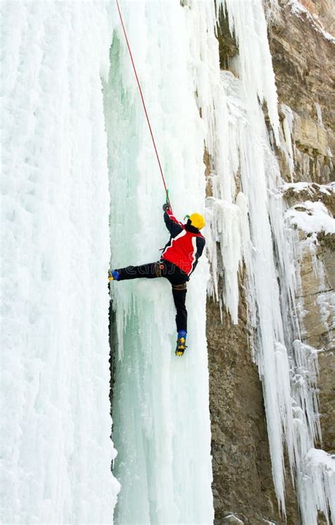 Man Climbing Frozen Waterfall Stock Image Image Of Recreation