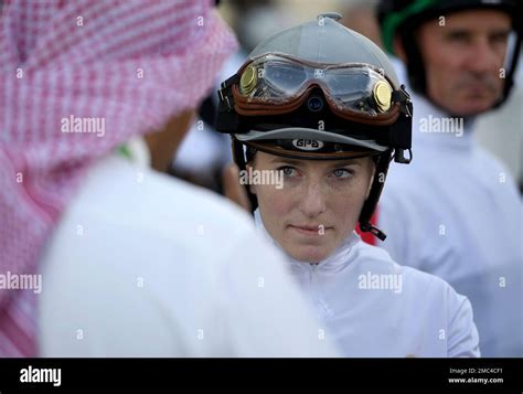 Jockey Jessica Pyfer Listens In A Pre Race Briefing During The