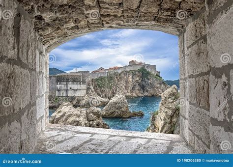 View From Stone Window Of Cliffs Sea And Dubrovnik Historic Wall Stock