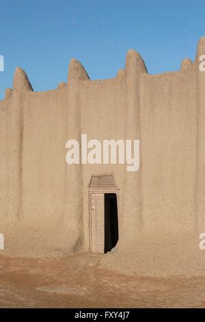 A door of the Great Mosque of Djenné Mali Africa the biggest adobe