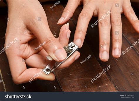 Closeup Woman Cutting Nails Stock Photo Edit Now 284510372