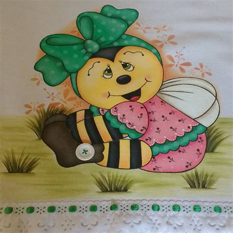 A Painting Of A Bee With A Green Bow On It S Head