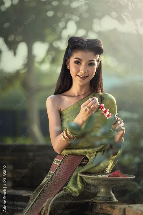 Thai Woman In Traditional Costume Of Thailand Stock Photo | Adobe Stock