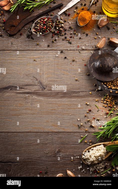 Various Herbs And Spices On Dark Wood Table Stock Photo Alamy