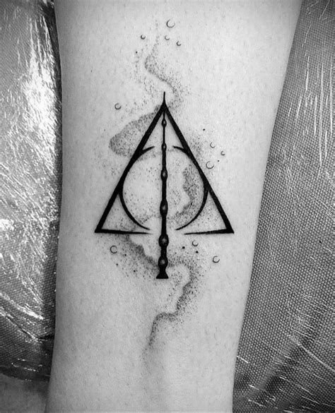 Meaning of the deathly hallows tattoo: features, photo examples of drawings, sketches, facts