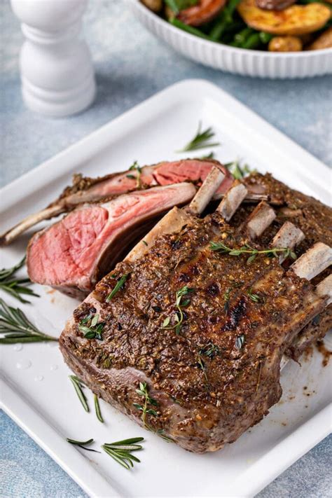 Herb Crusted Roasted Rack Of Lamb Lemon Blossoms