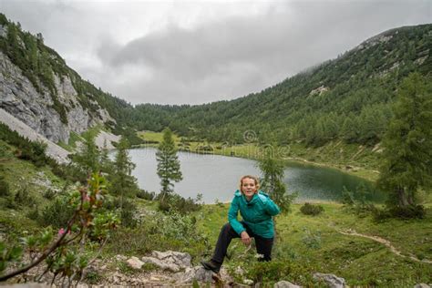 Hikers in the Austrian Alps Walk on Mountain Hiking Trails in the Woods ...