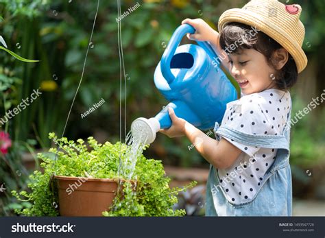 3564 Asian Kid Watering Plant Images Stock Photos And Vectors