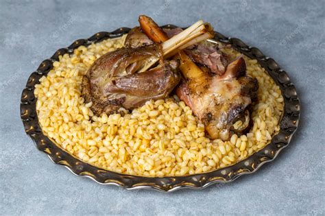 Premium Photo Turkish Foods Lamb Shank Tandoori On Bulgur Wheat Rice Turkish Name Bulgur