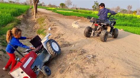 Homemade Mini Tractor Mahindra Stuck In Soil And Four By Four Pulling