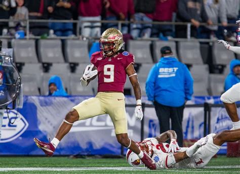 2023 ACC Championship: Louisville vs Florida State football photos