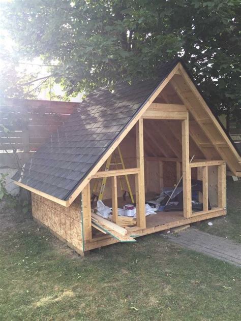 Tiny Off Grid Cabin Made From Pallets Reclaimed Lumber Artofit