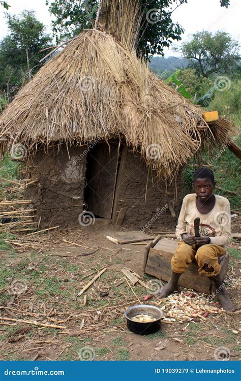 African Boy And Mud Hut Editorial Stock Image - Image: 19039279