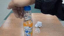 how to open ramune cap