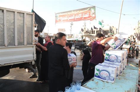 Kufa Mosque Distributes Drinking Water Among Husseini Mawakib Shia Waves