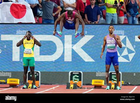 Noah Lyles Of The United States Leaps Into The Air Before Starting