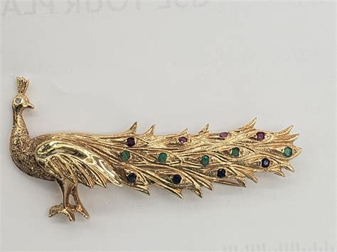 14k Yellow Gold Peacock Brooch With Sapphires Emera Gem