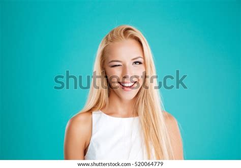 Close Portrait Smiling Blonde Woman Winking Stock Photo Edit Now