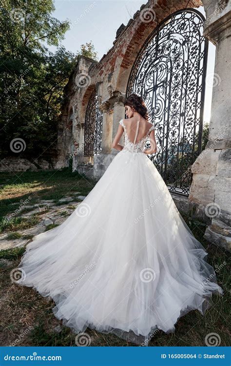 A Woman In A Wedding Dress Enjoying Happy Moments Of The Happiest