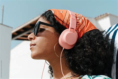 Summer Woman With Headphones And Sunglasses By Stocksy Contributor