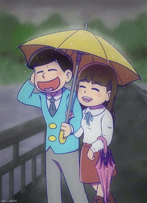 Two People Standing Under An Umbrella In The Rain