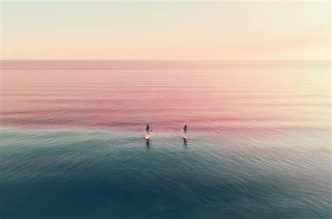 Vista Aérea De Una Pareja De Paddle Surf En El Concepto De Deporte