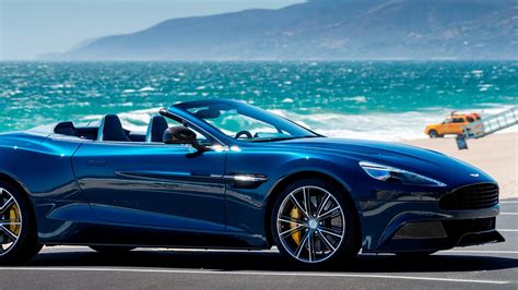 Blue and convertible Aston Martin Vanquish Volante Wallpaper Download 1920x1080