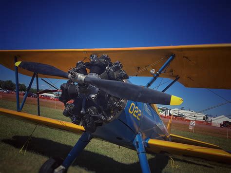 A Biplane Naps With Its Beautiful Color Scheme And Design