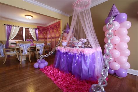 Balloon Decor By Front Window And Tulle With Lights Around Table