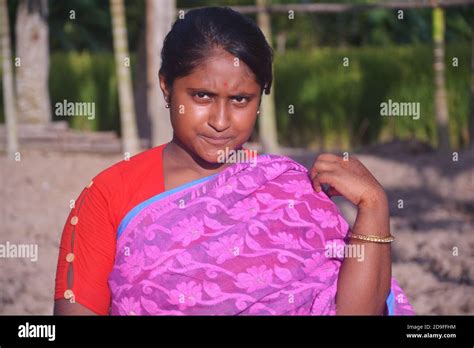 Close Up Of A Teenage Indian Bengali Girl Wearing Sari With Long Hairs