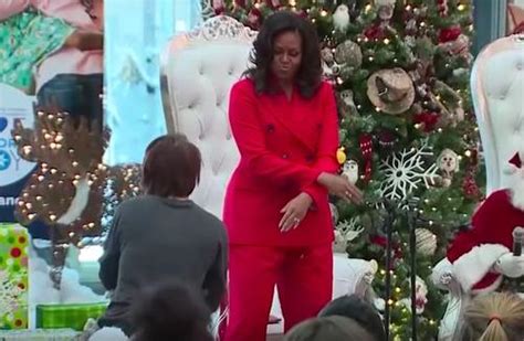 Michelle Obama Performs Fortnite's 'Orange Justice' Dance With Santa Claus