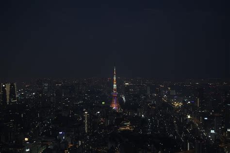 Premium Photo Illuminated Buildings In City At Night View Over Tokyo