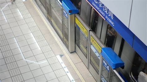 View Of Crowded Passenger Waiting For Arriving Subway Train At